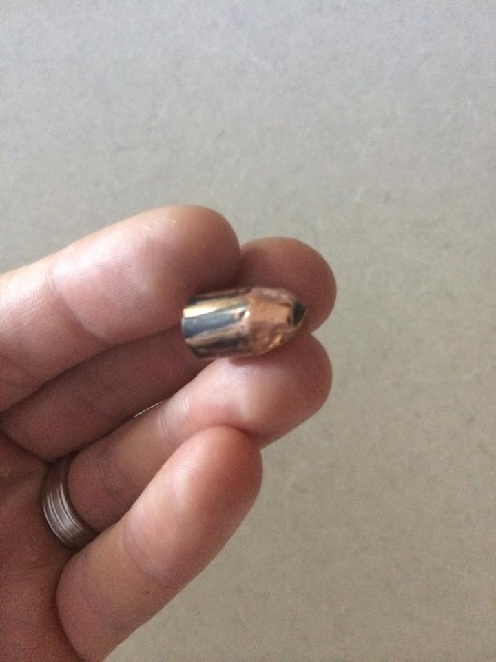 Bullet found on ground Saturday morning.