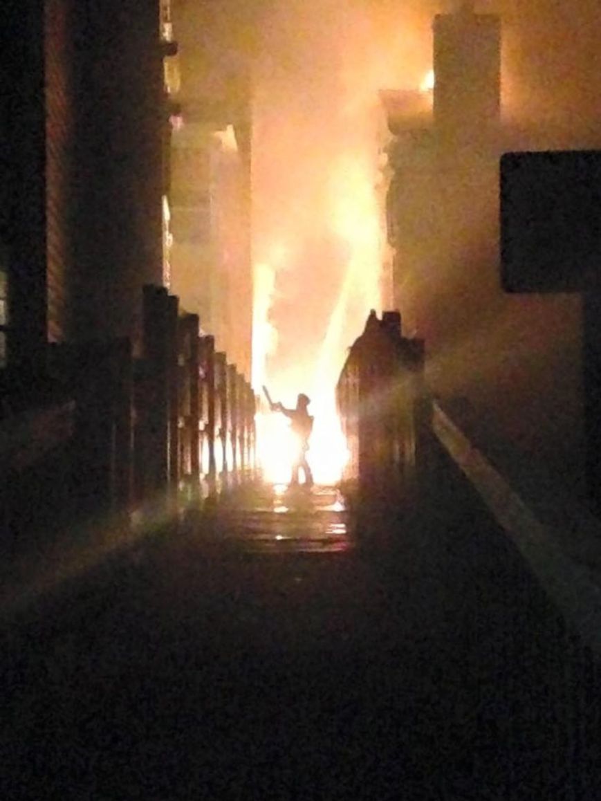 Fireman trying to fight the flames at the Page Court condo fire on April 23, 2015. (Photo: Bobbi Sawyers?,13News Now viewer