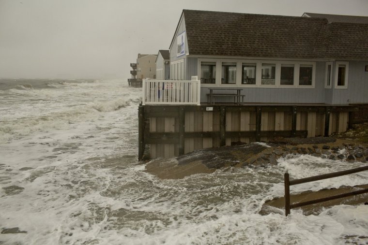 Breezy conditions and heavy rain affect the shoreline at Chic's Beach on Friday, Oct. 2, 2015, in Virginia Beach. (Rich-Joseph Facun | The Virginian-Pilot)